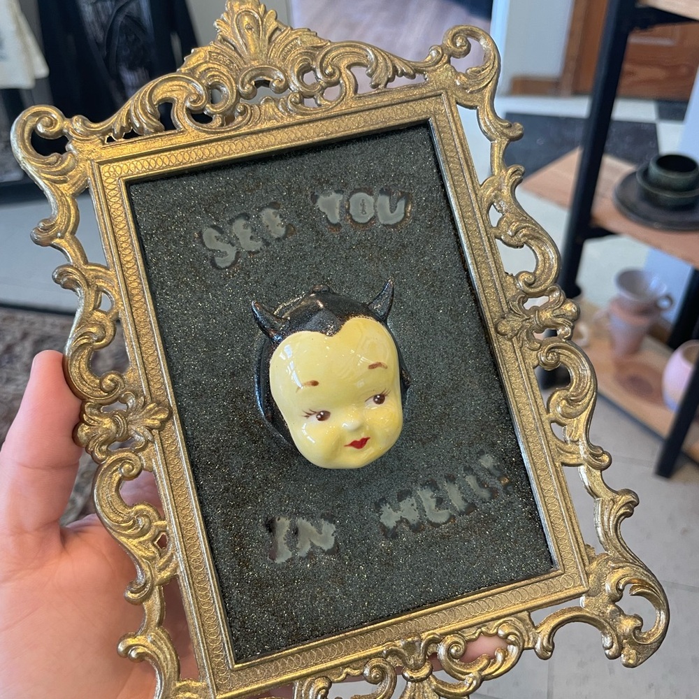 handmade ceramic wall art devil cherub